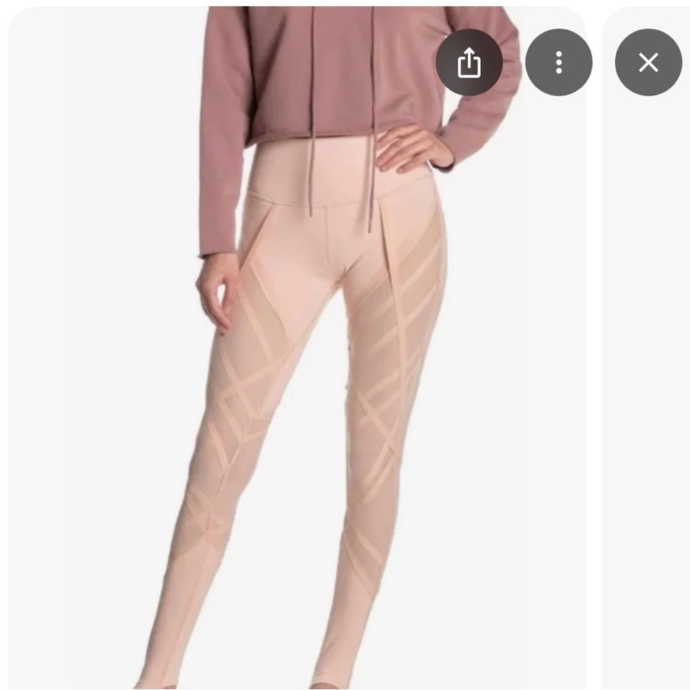 ALO Yoga Pink Stirrup Leggings with High Waist and Sleek Fit